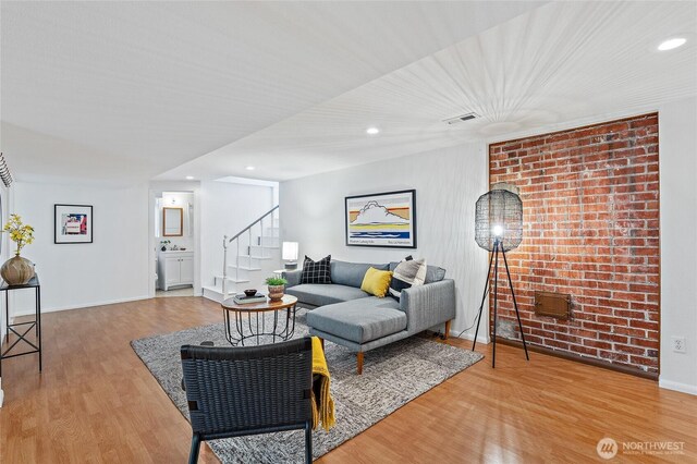 4603 15th Ave S, Seattle, WA 98108 - living area featuring wood finished floors, stairway, and recessed lighting