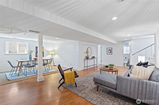 4603 15th Ave S, Seattle, WA 98108 - living area featuring wood finished floors, stairs, and recessed lighting