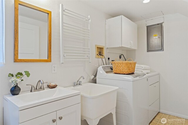 4603 15th Ave S, Seattle, WA 98108 - washroom featuring electric panel, separate washer and dryer, and cabinet space