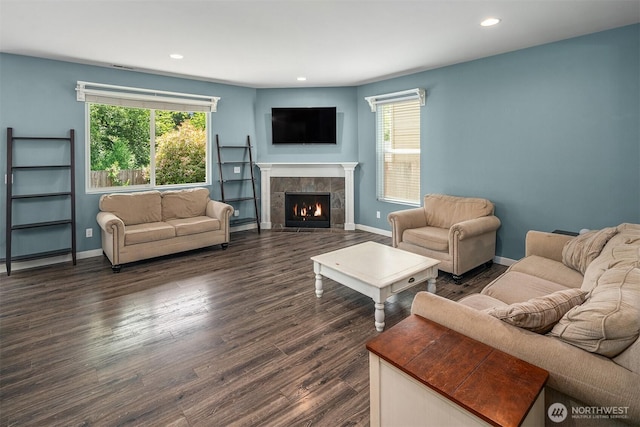 15527 E 82nd Ave E, Puyallup, WA 98375 - living room featuring plenty of natural light, dark wood finished floors, recessed lighting, and a fireplace