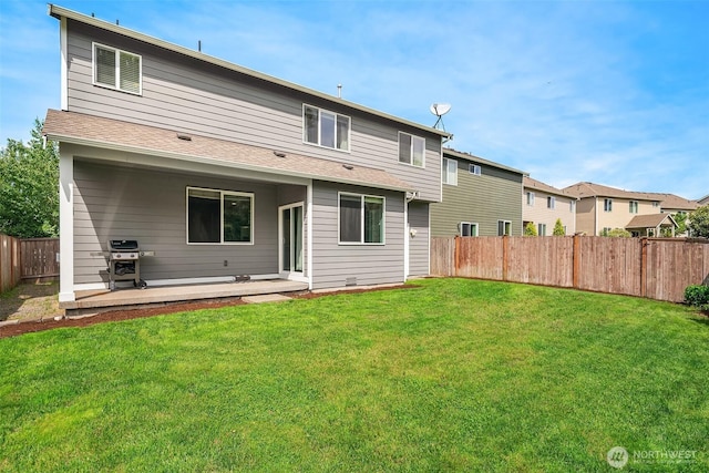 15527 E 82nd Ave E, Puyallup, WA 98375 - rear view of house with a fenced backyard