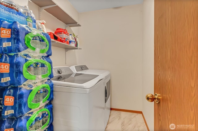 221 S Prairie Carbon River Rd E, South Prairie, WA 98385 - laundry room with separate washer and dryer and marble look tile flooring