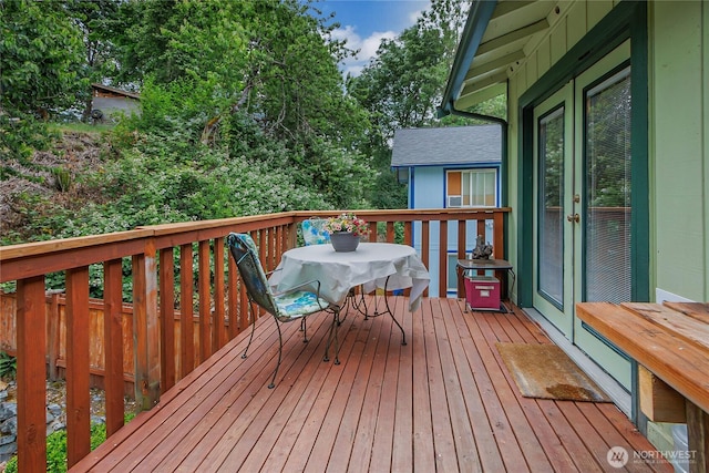 221 S Prairie Carbon River Rd E, South Prairie, WA 98385 - deck with french doors and outdoor dining area