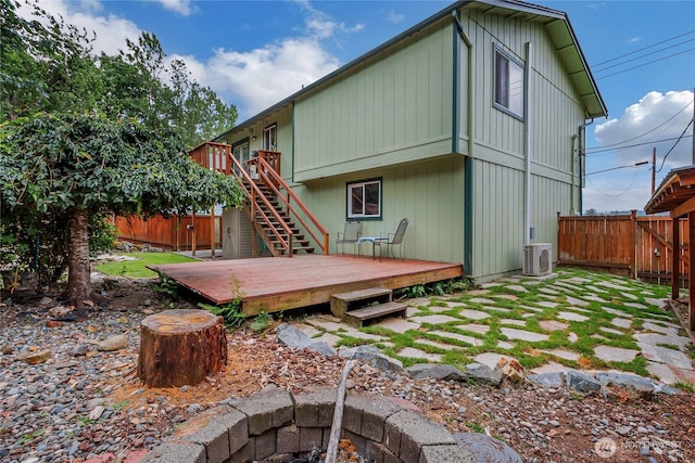 221 S Prairie Carbon River Rd E, South Prairie, WA 98385 - rear view of property with a wooden deck and stairs
