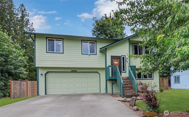 221 S Prairie Carbon River Rd E, South Prairie, WA 98385 - split foyer home featuring driveway and a garage