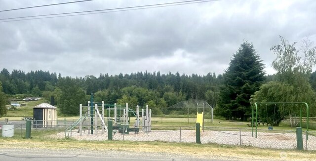 221 S Prairie Carbon River Rd E, South Prairie, WA 98385 - community jungle gym featuring a forest view