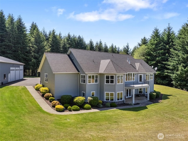 42811 Newaukum Valley Rd, Chehalis, WA 98532 - back of property featuring a yard, a detached garage, and an outbuilding