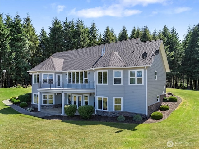 42811 Newaukum Valley Rd, Chehalis, WA 98532 - view of front of home featuring stone siding, a patio, a front lawn, and a balcony