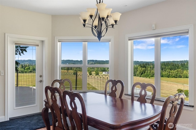 42811 Newaukum Valley Rd, Chehalis, WA 98532 - dining area featuring a chandelier and baseboards