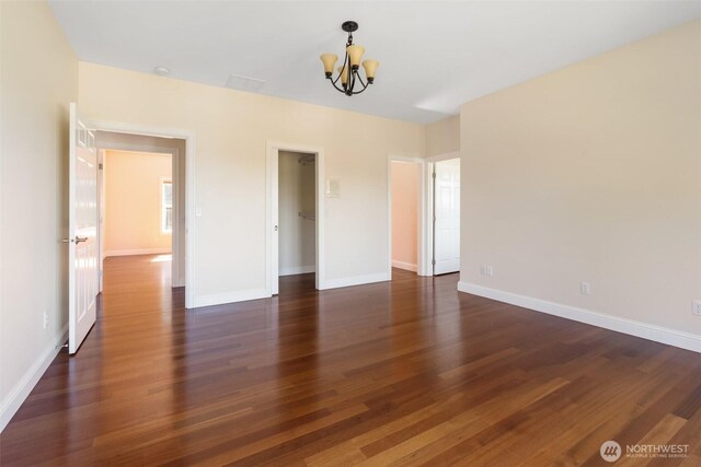 42811 Newaukum Valley Rd, Chehalis, WA 98532 - unfurnished room with a chandelier and wood finished floors
