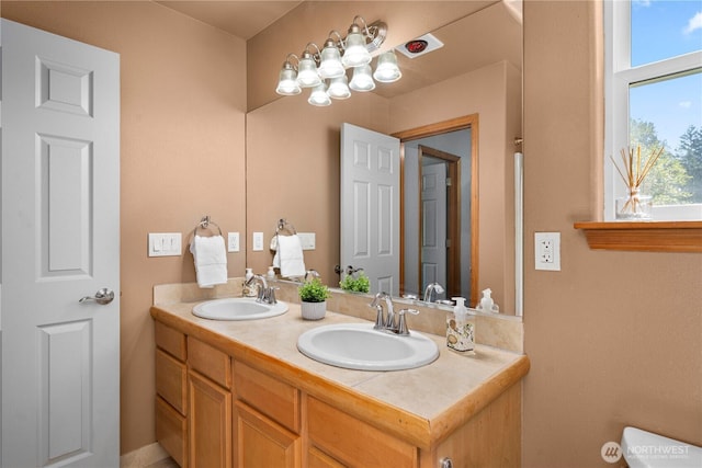 2502 218th St E, Spanaway, WA 98387 - bathroom with double vanity and toilet