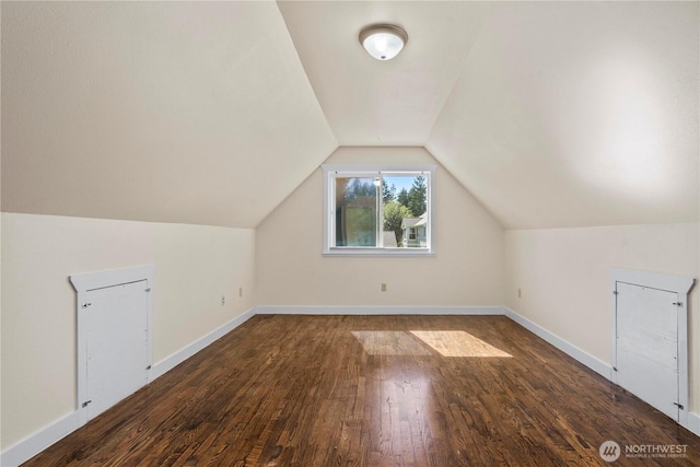 2502 218th St E, Spanaway, WA 98387 - bonus room featuring dark wood-type flooring and vaulted ceiling