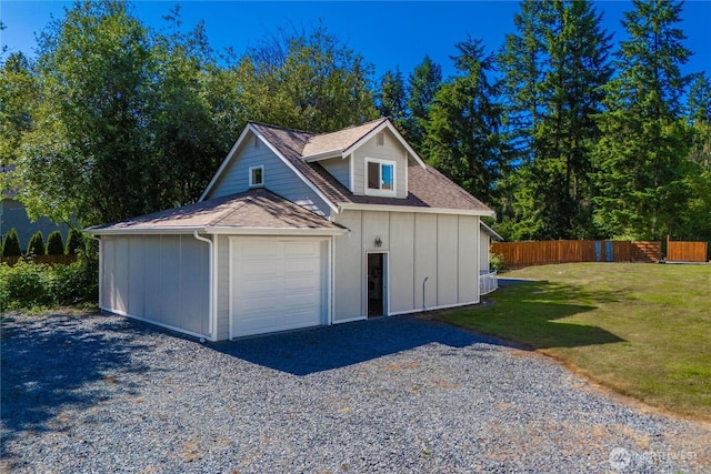 2502 218th St E, Spanaway, WA 98387 - garage featuring gravel driveway