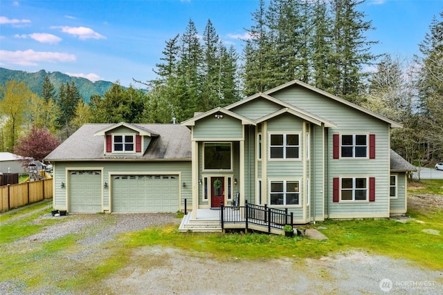 13617 436th Ave SE, North Bend, WA 98045 - view of front of home featuring a garage, driveway, and a mountain view