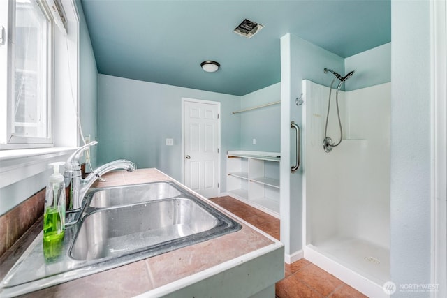 13617 436th Ave SE, North Bend, WA 98045 - bathroom with a shower, double vanity, and tile patterned flooring