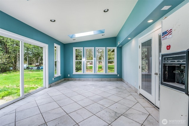 13617 436th Ave SE, North Bend, WA 98045 - unfurnished sunroom with a skylight, plenty of natural light, and lofted ceiling