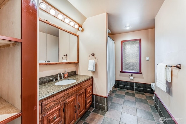 13617 436th Ave SE, North Bend, WA 98045 - full bathroom with vanity, curtained shower, and stone finish flooring