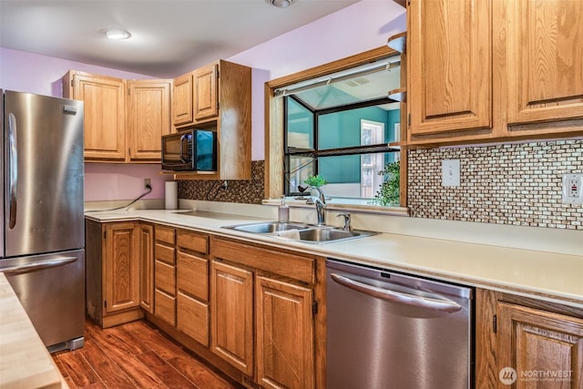13617 436th Ave SE, North Bend, WA 98045 - kitchen with appliances with stainless steel finishes, light countertops, dark wood finished floors, and tasteful backsplash