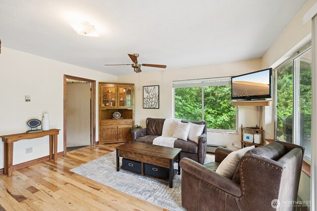 45908 SE Edgewick Rd, North Bend, WA 98045 - living area featuring light wood-style floors, a ceiling fan, and a baseboard radiator