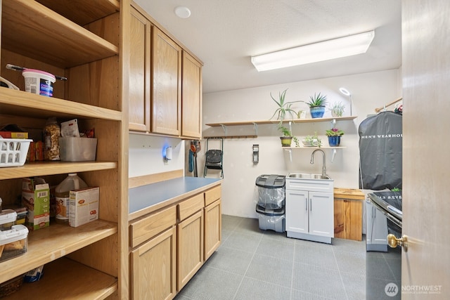 45908 SE Edgewick Rd, North Bend, WA 98045 - kitchen featuring open shelves, light tile patterned flooring, and range