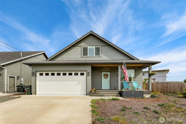 4123 Stuart Cir, Ferndale, WA 98248 - view of front of property featuring covered porch, concrete driveway, and a garage
