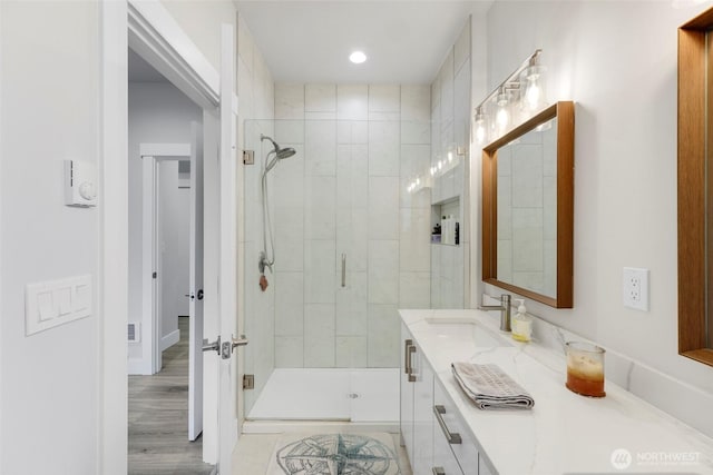 4123 Stuart Cir, Ferndale, WA 98248 - bathroom with a shower stall, vanity, and recessed lighting