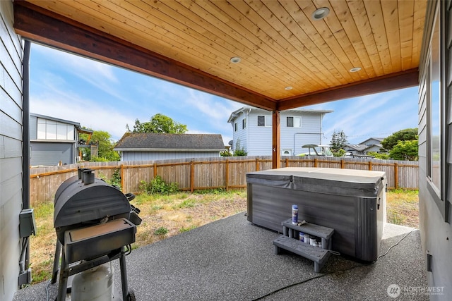 4123 Stuart Cir, Ferndale, WA 98248 - fenced backyard with a hot tub, a patio area, and grilling area