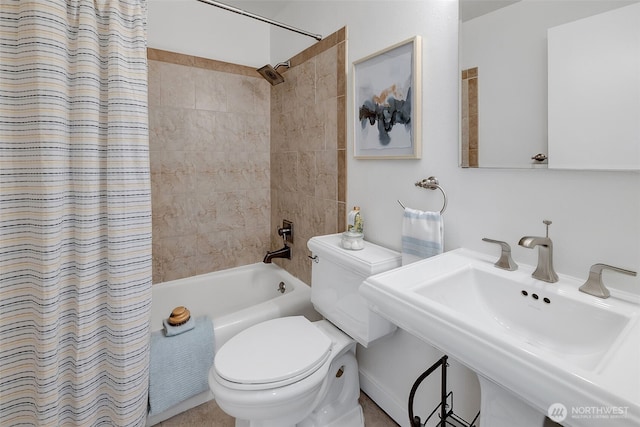 9500 Rainier Ave S Unit 303, Seattle, WA 98118 - full bath featuring shower / bath combo with shower curtain and toilet