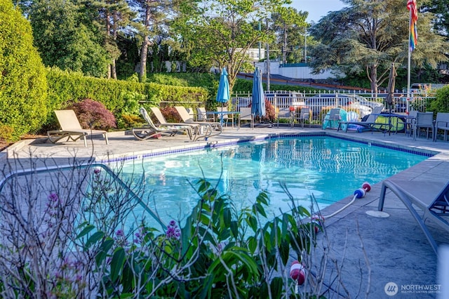 9500 Rainier Ave S Unit 303, Seattle, WA 98118 - community pool featuring a patio