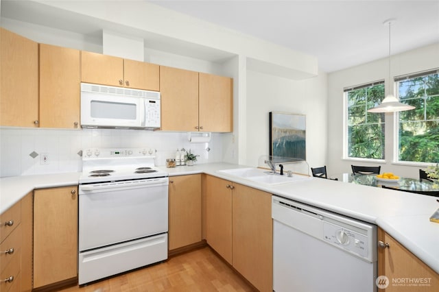 2840 139th Ave SE Unit 9, Bellevue, WA 98005 - kitchen with white appliances, light wood finished floors, backsplash, and light countertops