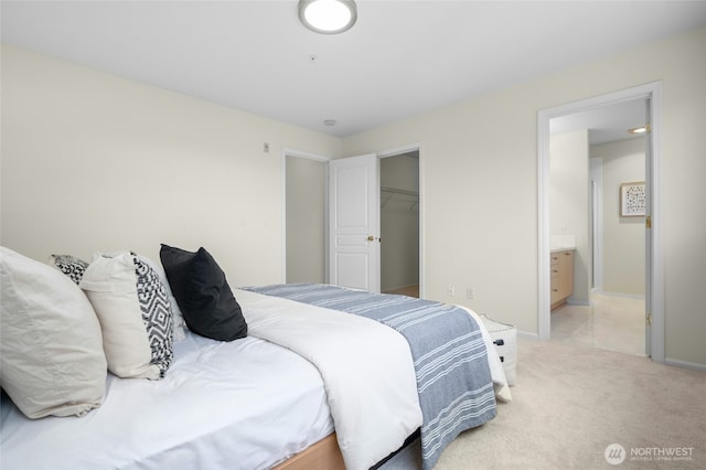 2840 139th Ave SE Unit 9, Bellevue, WA 98005 - bedroom featuring light colored carpet, a closet, a walk in closet, and ensuite bath