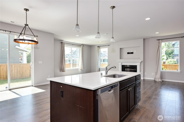 4236 SW Colbert Way, Port Orchard, WA 98367 - kitchen with dishwasher, a sink, baseboards, dark wood-style flooring, and recessed lighting