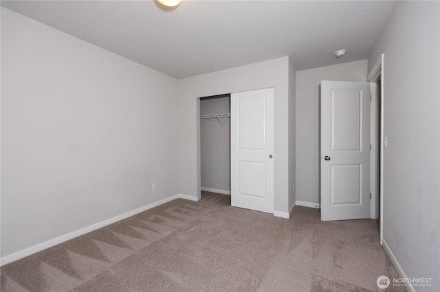 4236 SW Colbert Way, Port Orchard, WA 98367 - unfurnished bedroom featuring carpet floors, baseboards, and a closet