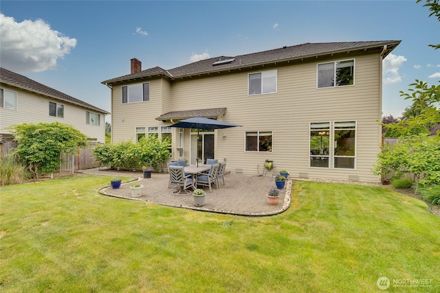 11318 34th Dr SE, Everett, WA 98208 - back of house featuring a chimney, a fenced backyard, and a patio area