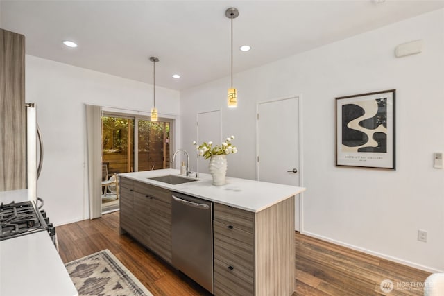 721 26th Ave S Unit B, Seattle, WA 98144 - kitchen with stainless steel dishwasher, light countertops, gas range oven, dark wood-style flooring, and recessed lighting