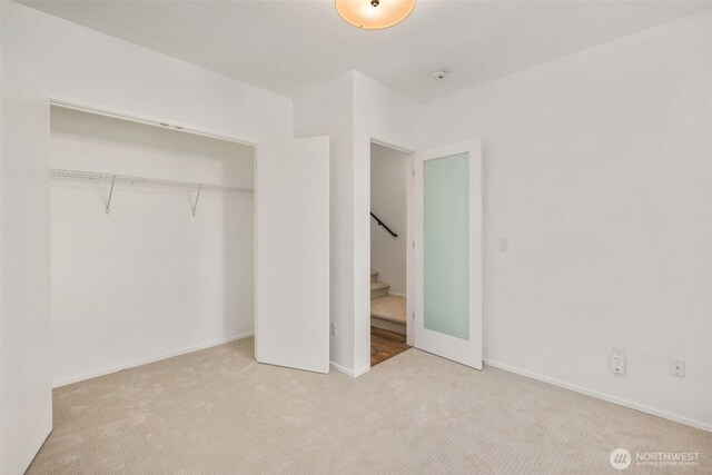 721 26th Ave S Unit B, Seattle, WA 98144 - unfurnished bedroom with carpet floors and a closet