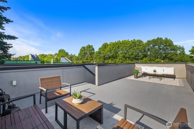 721 26th Ave S Unit B, Seattle, WA 98144 - wooden deck with outdoor lounge area and a patio