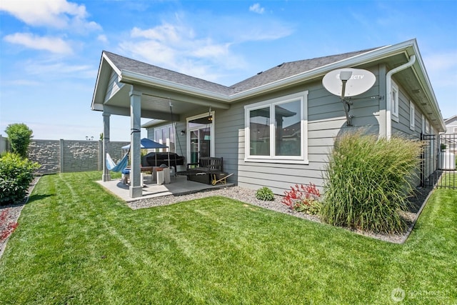 918 N M Loop Dr SW, Quincy, WA 98848 - rear view of property with an outdoor hangout area, a patio, and a fenced backyard