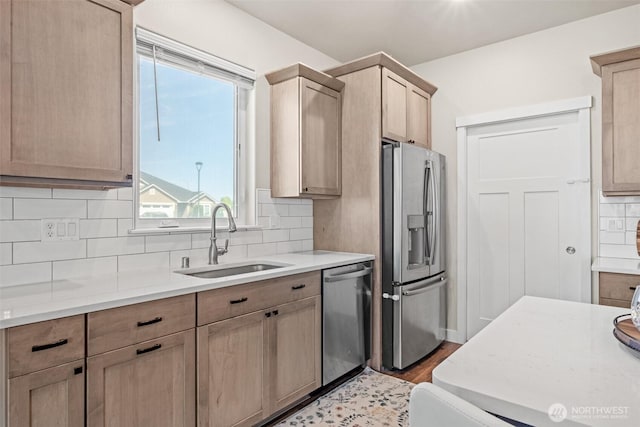 918 N M Loop Dr SW, Quincy, WA 98848 - kitchen featuring stainless steel appliances, tasteful backsplash, light countertops, and plenty of natural light