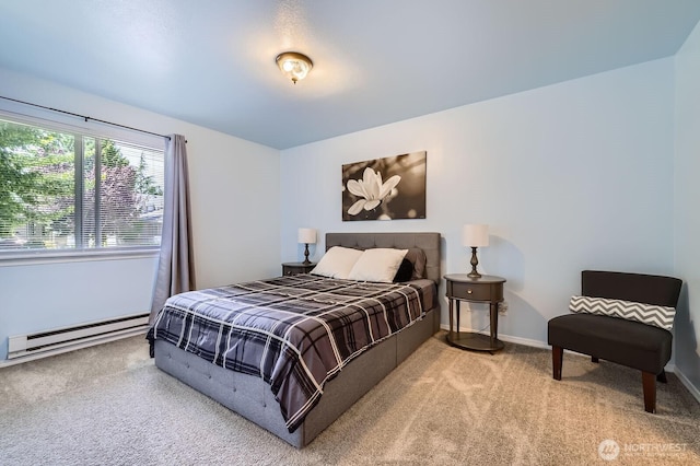 9210 Market Pl Unit F202, Lake Stevens, WA 98258 - carpeted bedroom featuring a baseboard radiator and baseboards