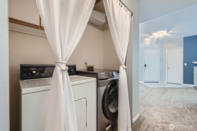 9210 Market Pl Unit F202, Lake Stevens, WA 98258 - laundry area with washer and dryer and light carpet