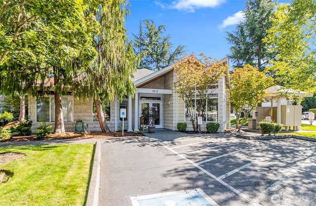 9210 Market Pl Unit F202, Lake Stevens, WA 98258 - view of front of home featuring uncovered parking and french doors