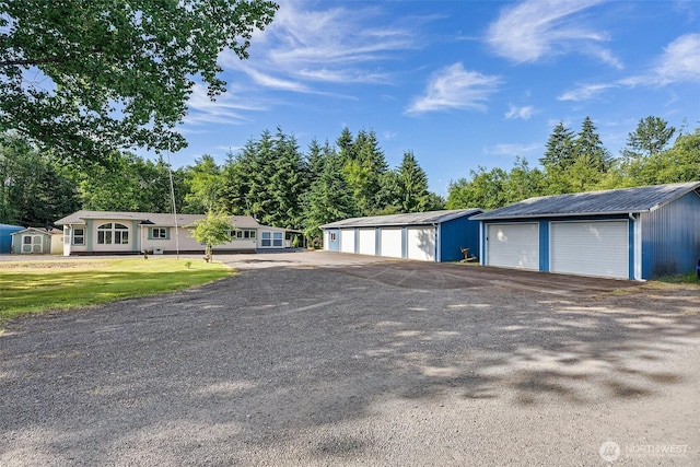 187 Dusty Ln, Chehalis, WA 98532 - view of front of home with a detached garage and a storage unit