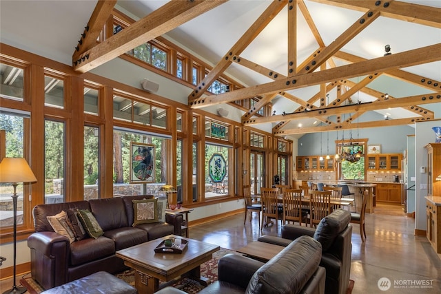 401 Quail Valley Rd, Cle Elum, WA 98922 - living room featuring high vaulted ceiling, a chandelier, and beamed ceiling