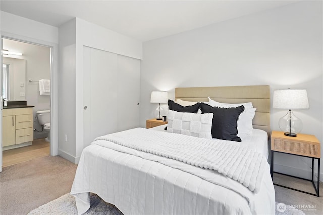 17905 35th Ave SE Unit C3, Bothell, WA 98012 - bedroom with light carpet, a closet, and ensuite bath