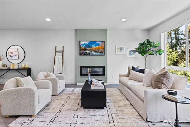 17905 35th Ave SE Unit C3, Bothell, WA 98012 - living area featuring recessed lighting, a glass covered fireplace, and light wood-type flooring