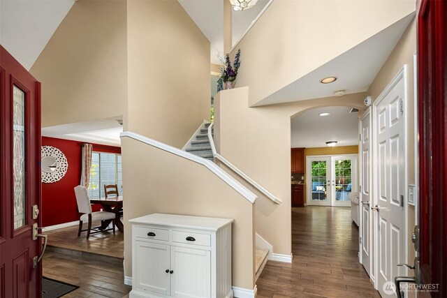 15214 102nd Ave NE, Bothell, WA 98011 - entrance foyer with dark wood-type flooring, arched walkways, stairs, high vaulted ceiling, and recessed lighting
