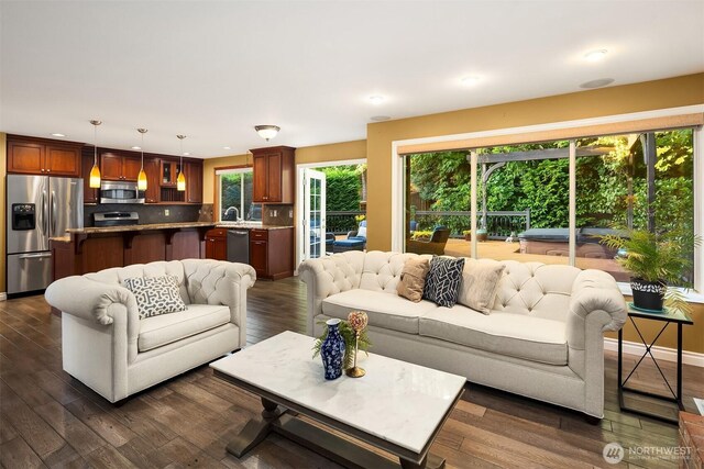 15214 102nd Ave NE, Bothell, WA 98011 - living area featuring dark wood finished floors and recessed lighting
