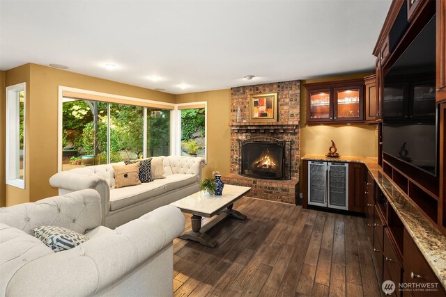 15214 102nd Ave NE, Bothell, WA 98011 - living room with dark wood finished floors, a brick fireplace, bar area, and wine cooler