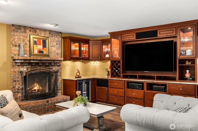 15214 102nd Ave NE, Bothell, WA 98011 - living area with wood finished floors, wine cooler, and a brick fireplace